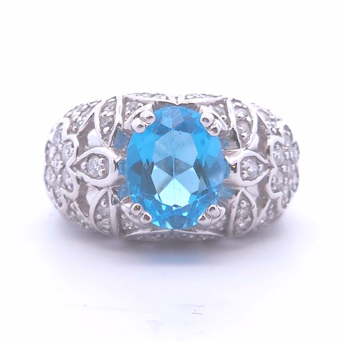 4.54ct Oval Blue Topaz Ring in 14k WG