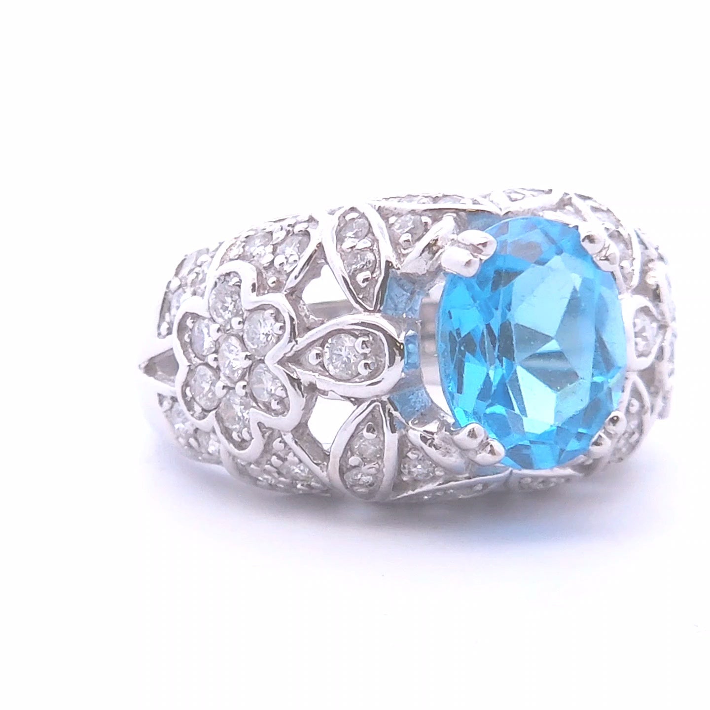 4.54ct Oval Blue Topaz Ring in 14k WG