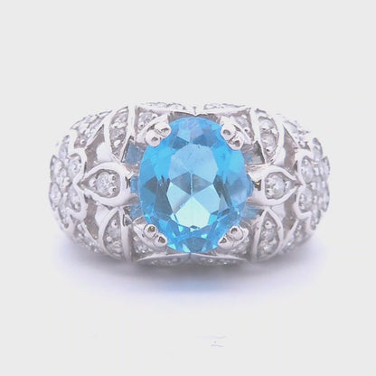 4.54ct Oval Blue Topaz Ring in 14k WG
